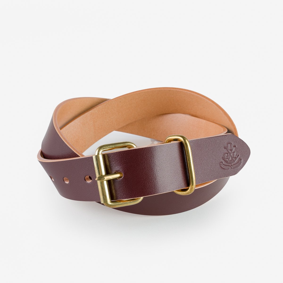 Brown leather belt with brass buckle and embossed logo on the tip, on white background