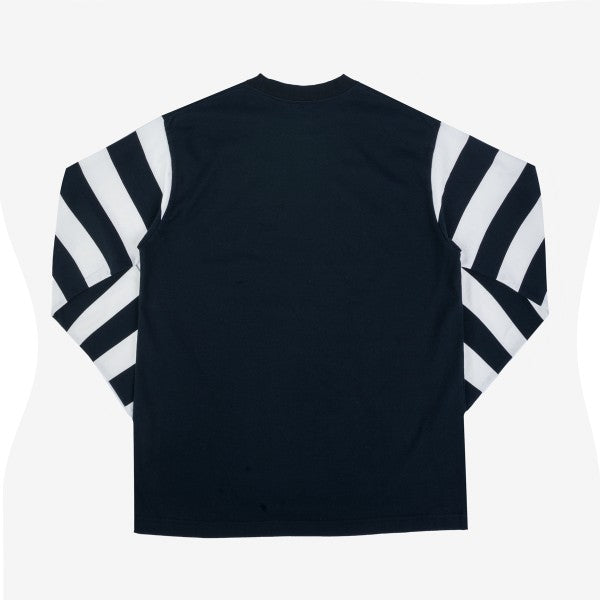 Black long-sleeve shirt with bold white and black striped sleeves laid flat on white background