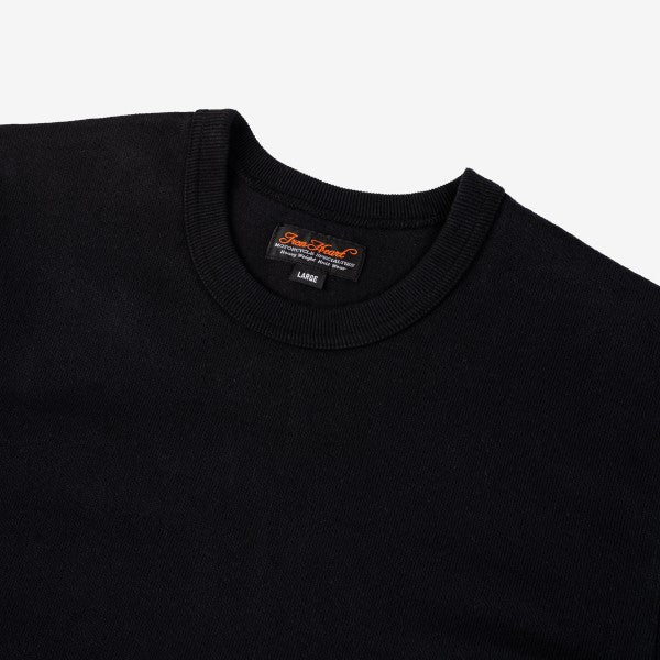 Black crew neck sweater with orange Iron Shop Provisions label in size large