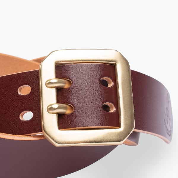 Brown leather belt with a square brass double-prong buckle, handcrafted from premium leather by Iron Shop Provisions