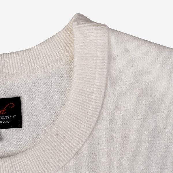 Close-up of white ribbed crew neck collar on cotton sweatshirt with visible black fabric label