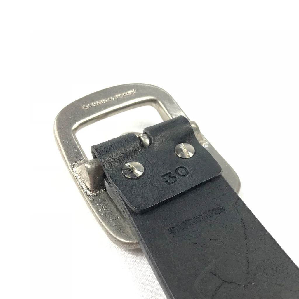Close-up of black leather belt with metal buckle and size 30 embossed, Samurai Jeans branding