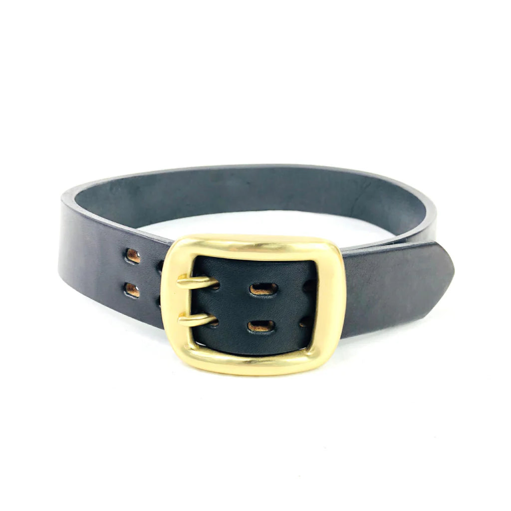Black leather belt with wide gold double-prong buckle isolated on white background
