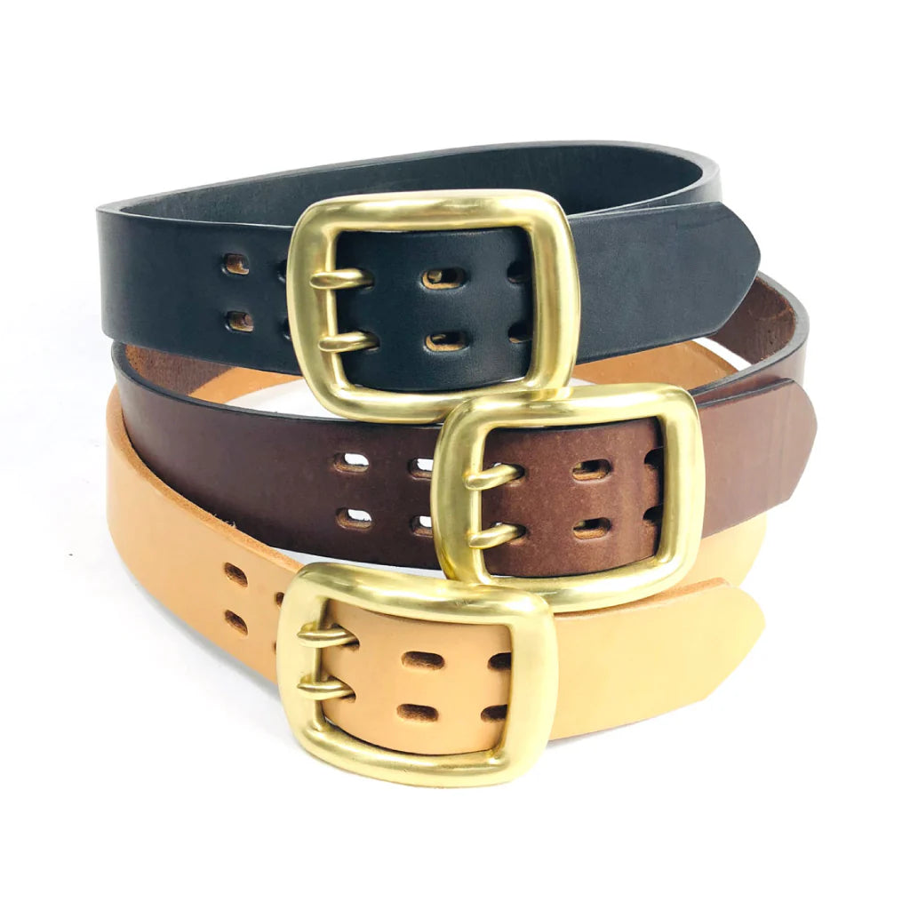 Three high-quality leather belts in black, brown, and natural colors with brass buckles stacked