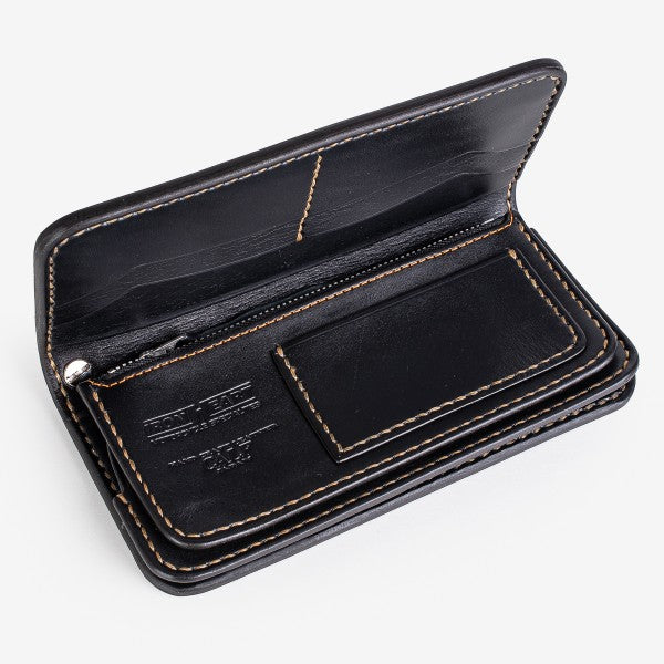 Black leather bifold wallet with tan stitching and embossed Iron Shop Provisions logo, open view