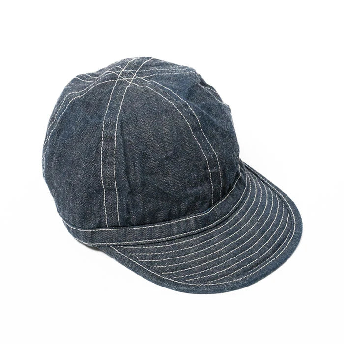 Blue denim cap on a white background