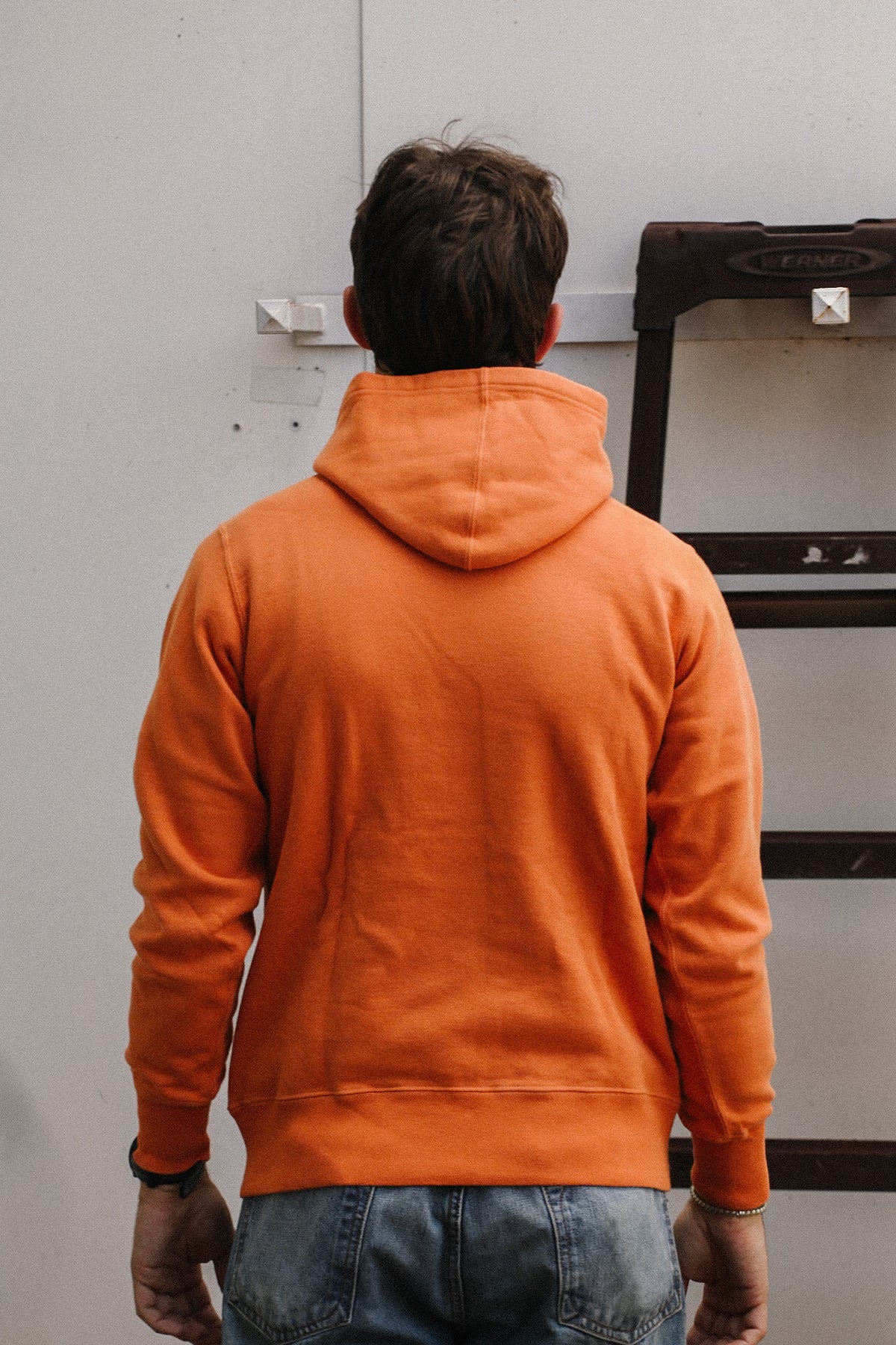 close up detail of a orange sweater