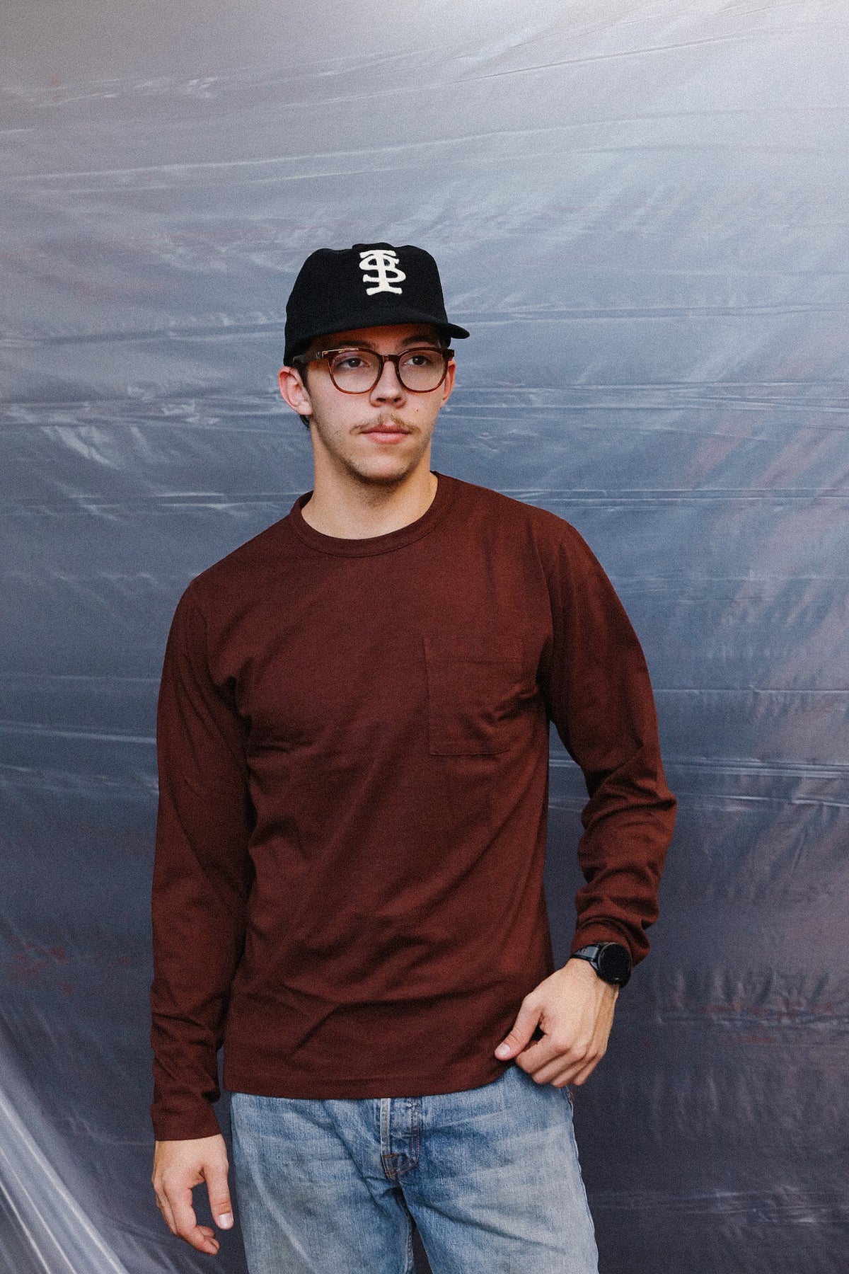 man wearing Burgundy long sleeve t-shirt