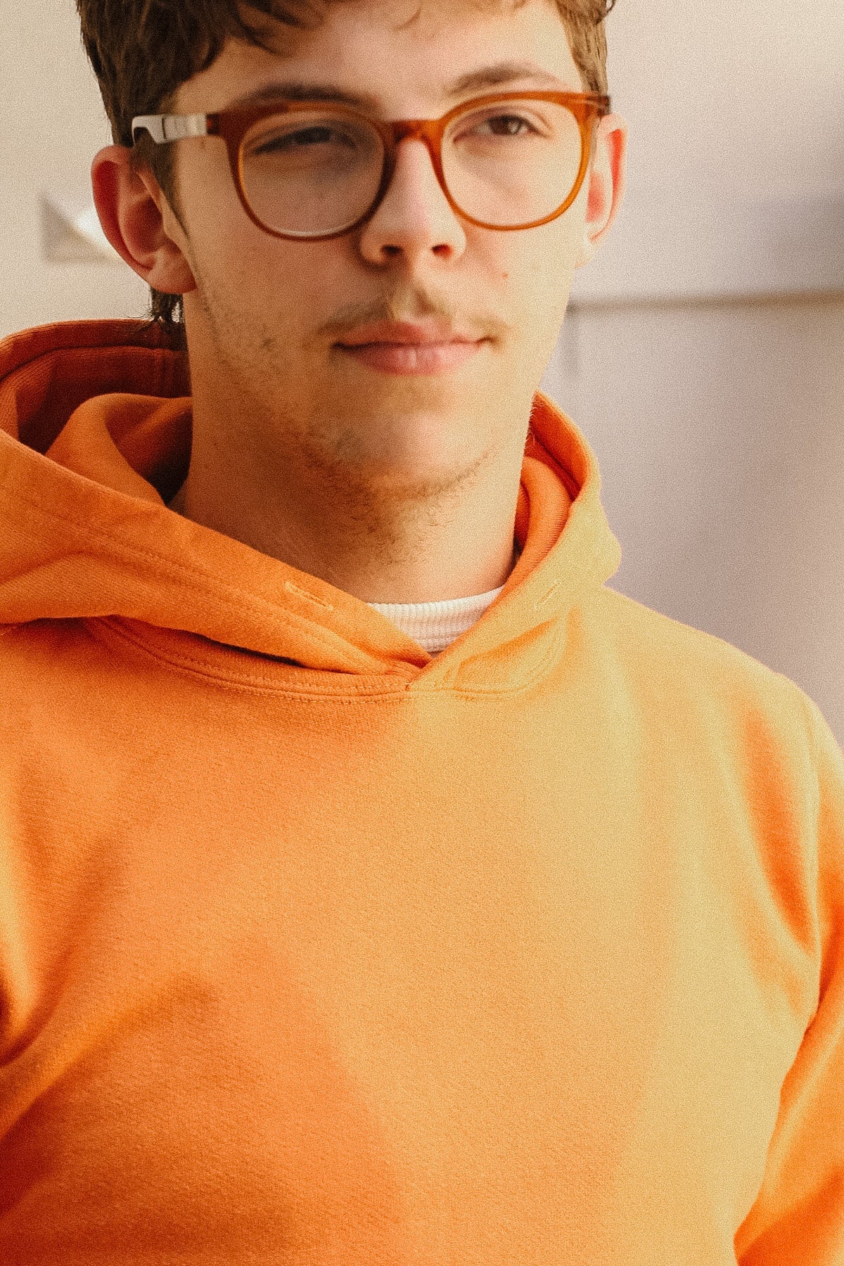 close up detail of a orange sweater