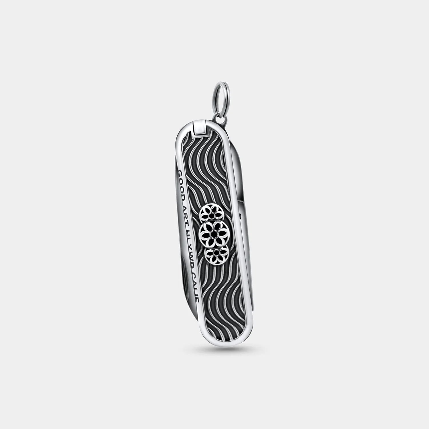 Silver miniature pocket knife charm with wavy black enamel and floral details, Good Art HLYWD style