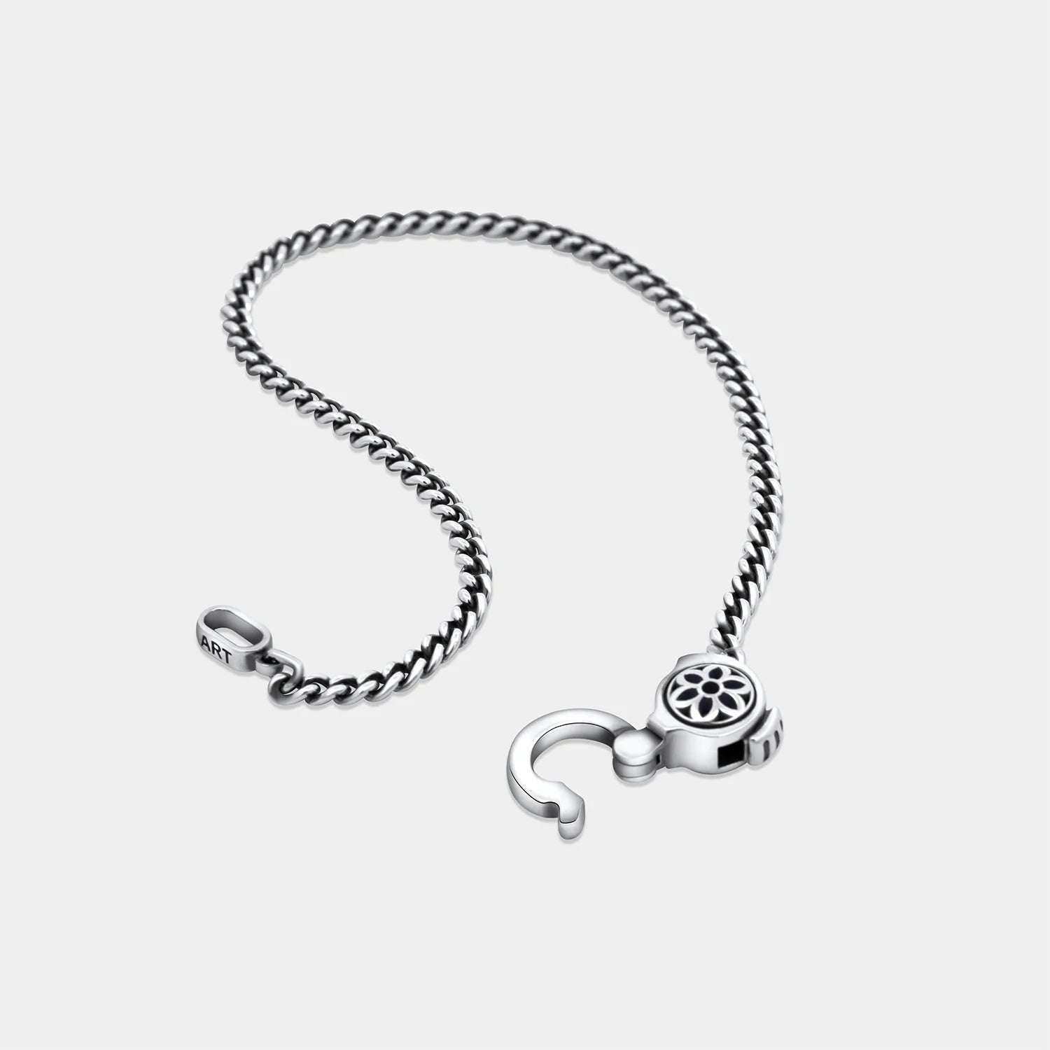 Sterling silver curb chain with floral motif clasp from Iron Shop Provisions, elegant handmade jewelry