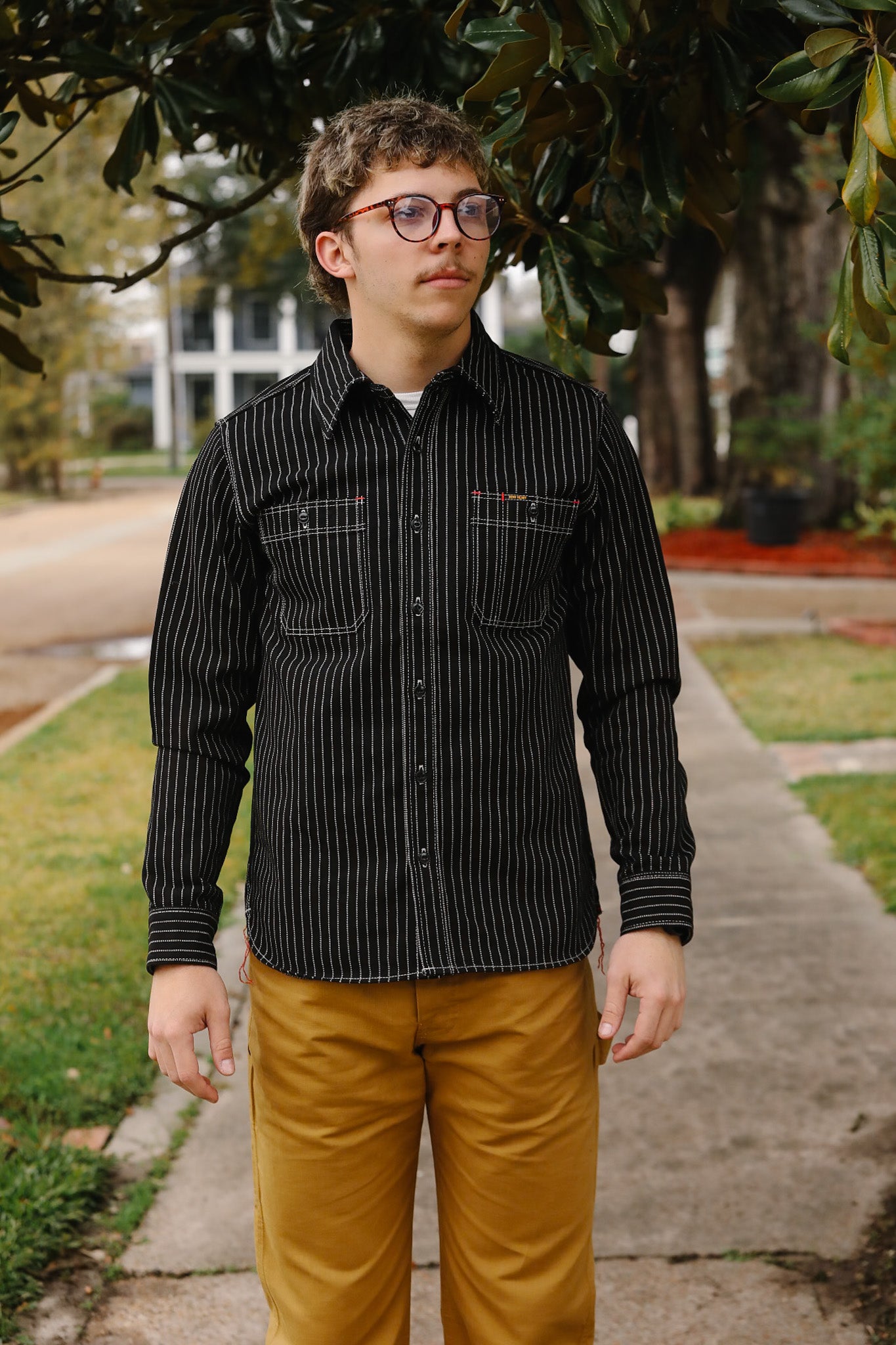 man wearing IHSH-266-IND 12oz Wabash Work Shirt - Indigo With Black Buttons
