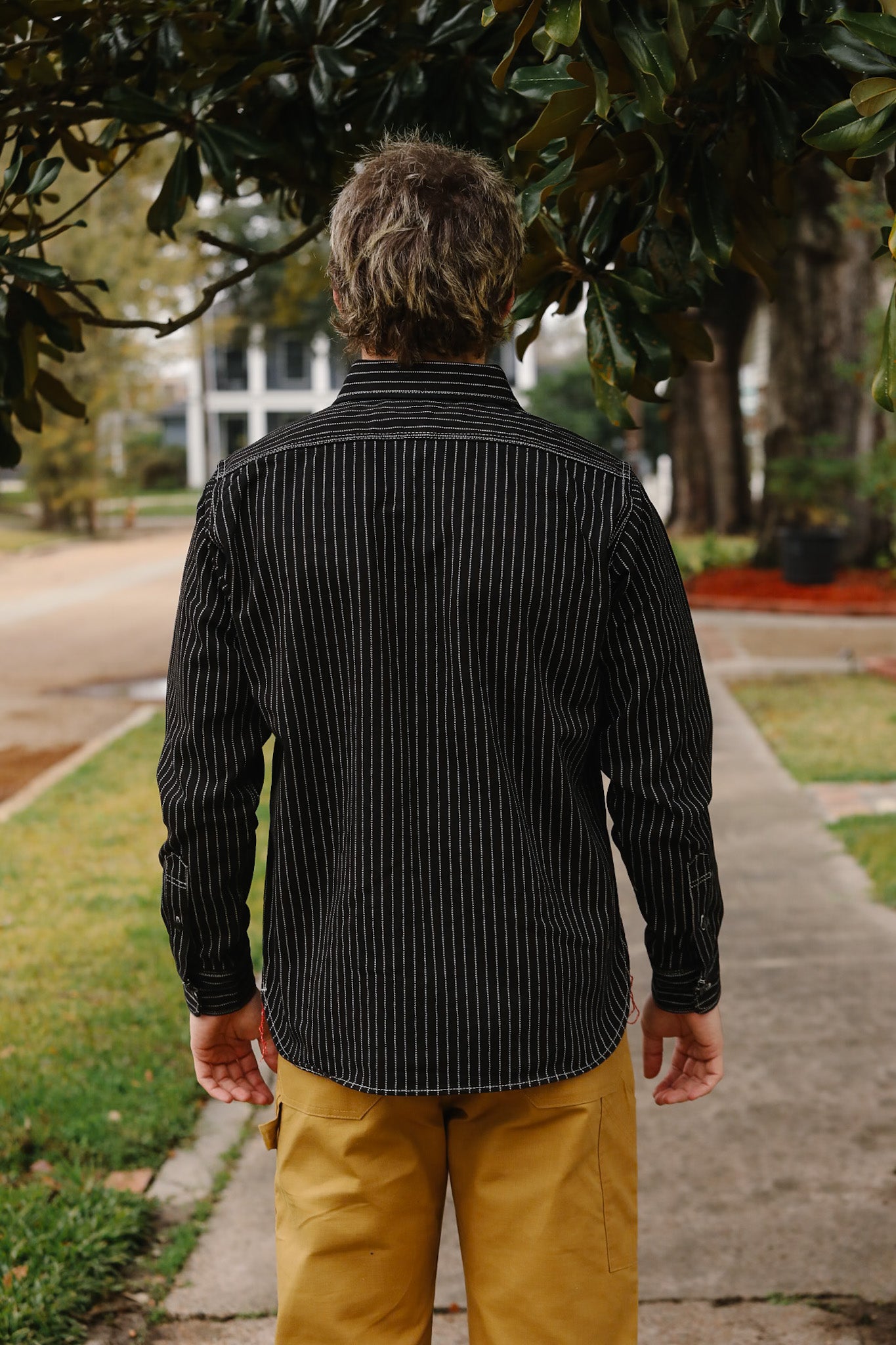 man wearing IHSH-266-IND 12oz Wabash Work Shirt - Indigo With Black Buttons