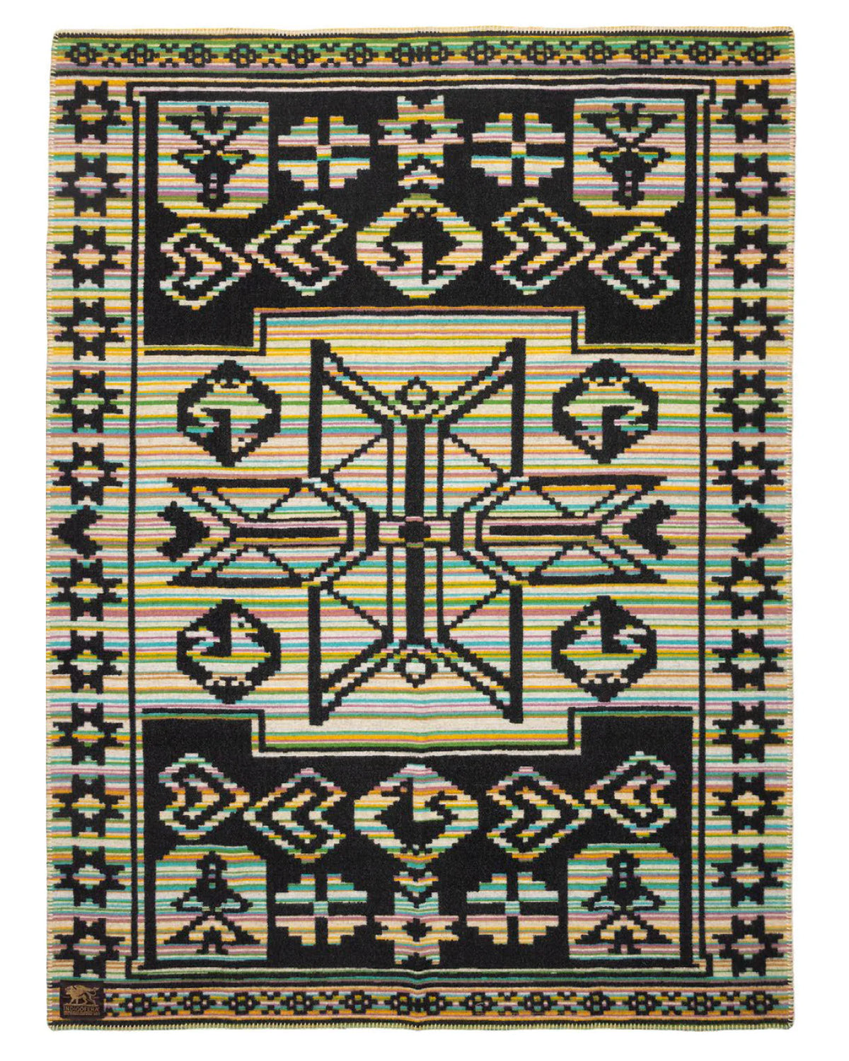 Indigofera Revinge blanket with geometric black patterns on multicolored striped background