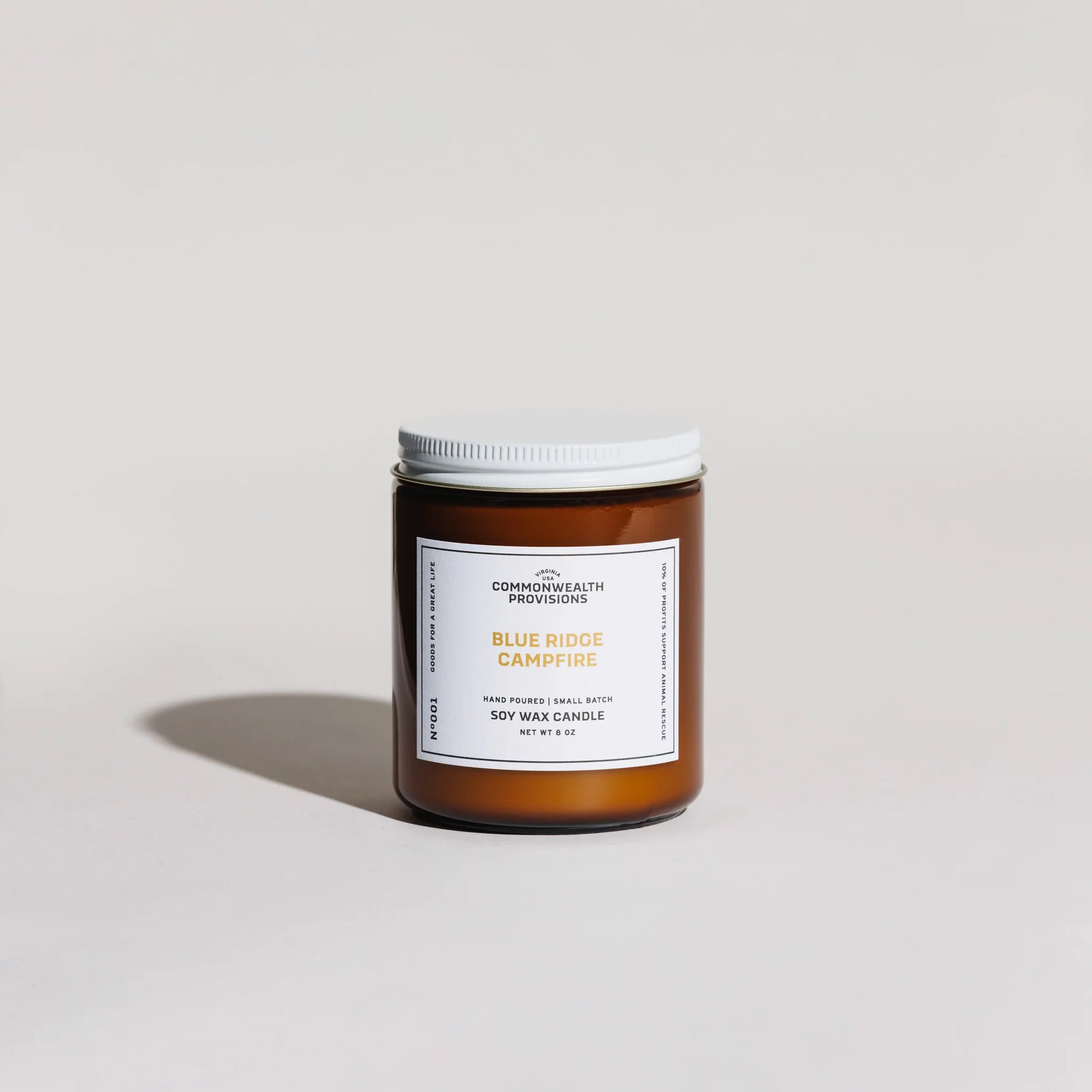 Commonwealth Provisions Blue Ridge Campfire soy wax candle in amber jar with white lid