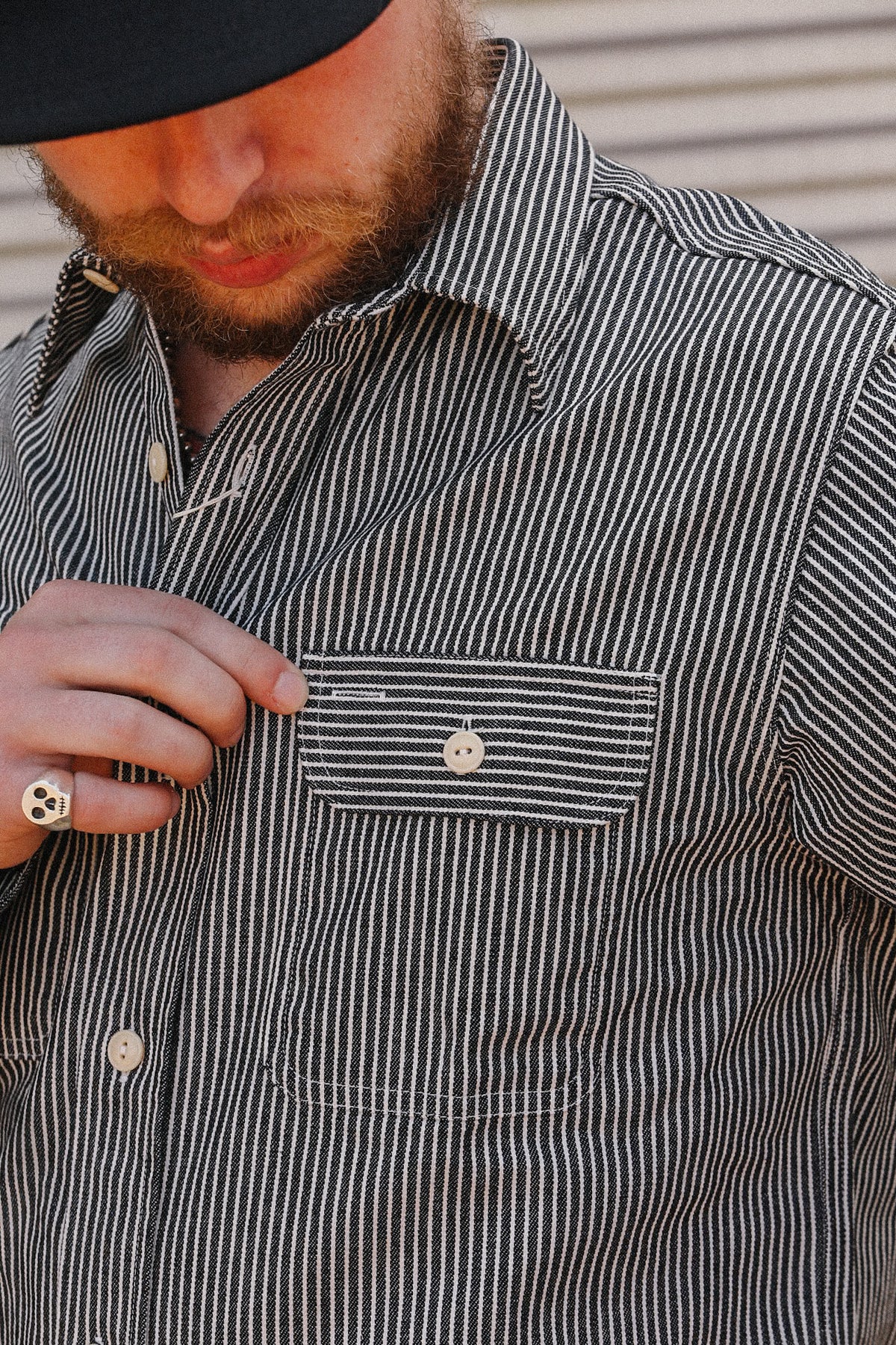 Up close detail of striped denim shirt