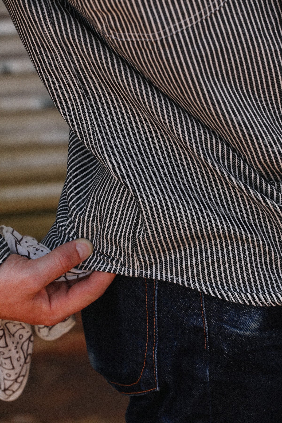 Up close detail of striped denim shirt