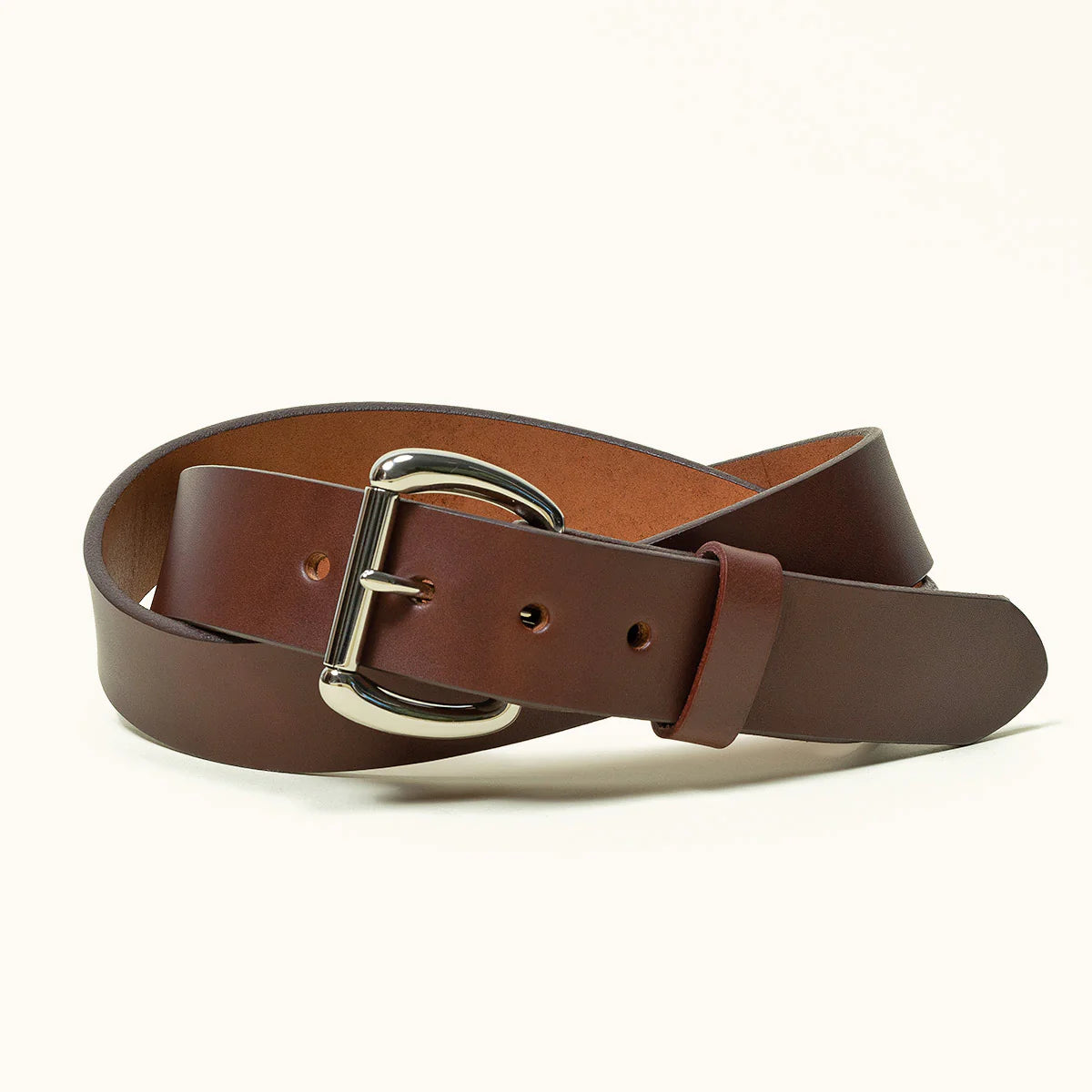 Cognac leather belt with silver buckle from Iron Shop Provisions on white background