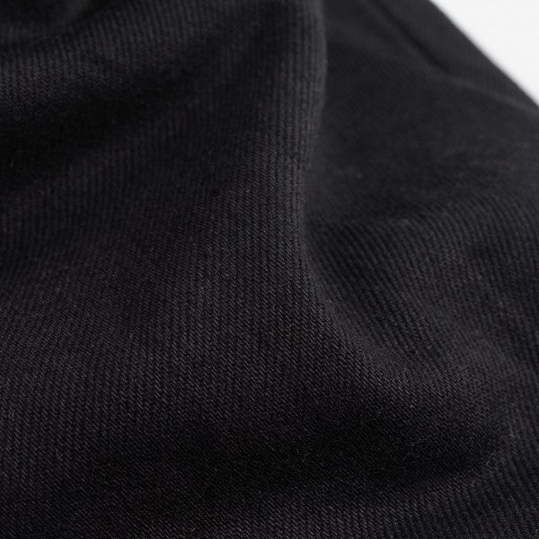 Close-up texture of black heavy-duty canvas fabric from Iron Shop Provisions