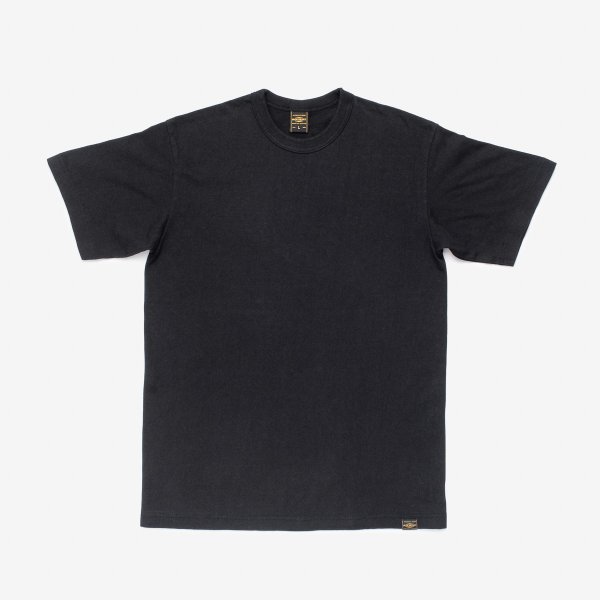 Plain black short-sleeve crew neck t-shirt laid flat with sewn label near hem, from Iron Shop Provisions
