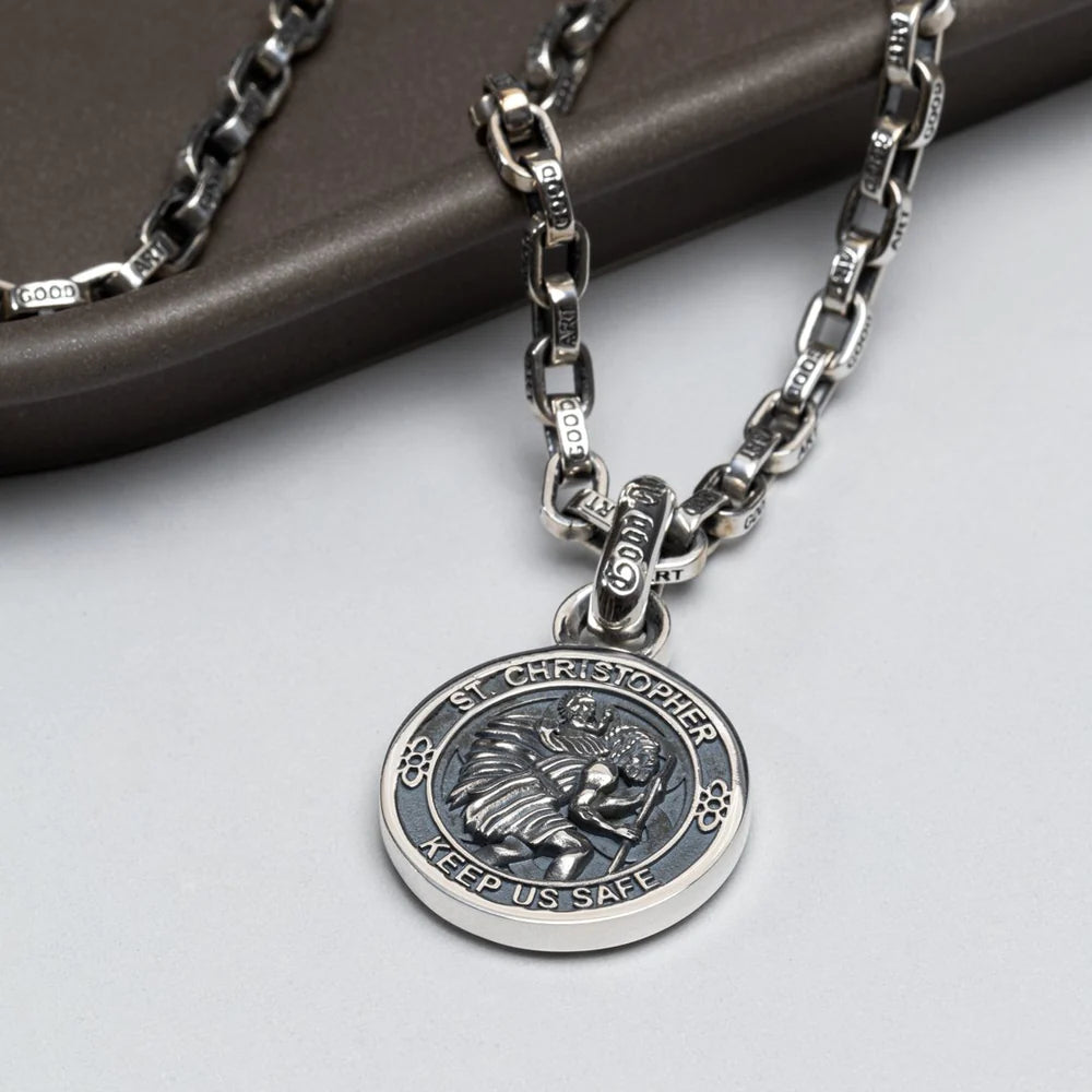 Silver St. Christopher pendant necklace with detailed chain and engravings from Iron Shop Provisions