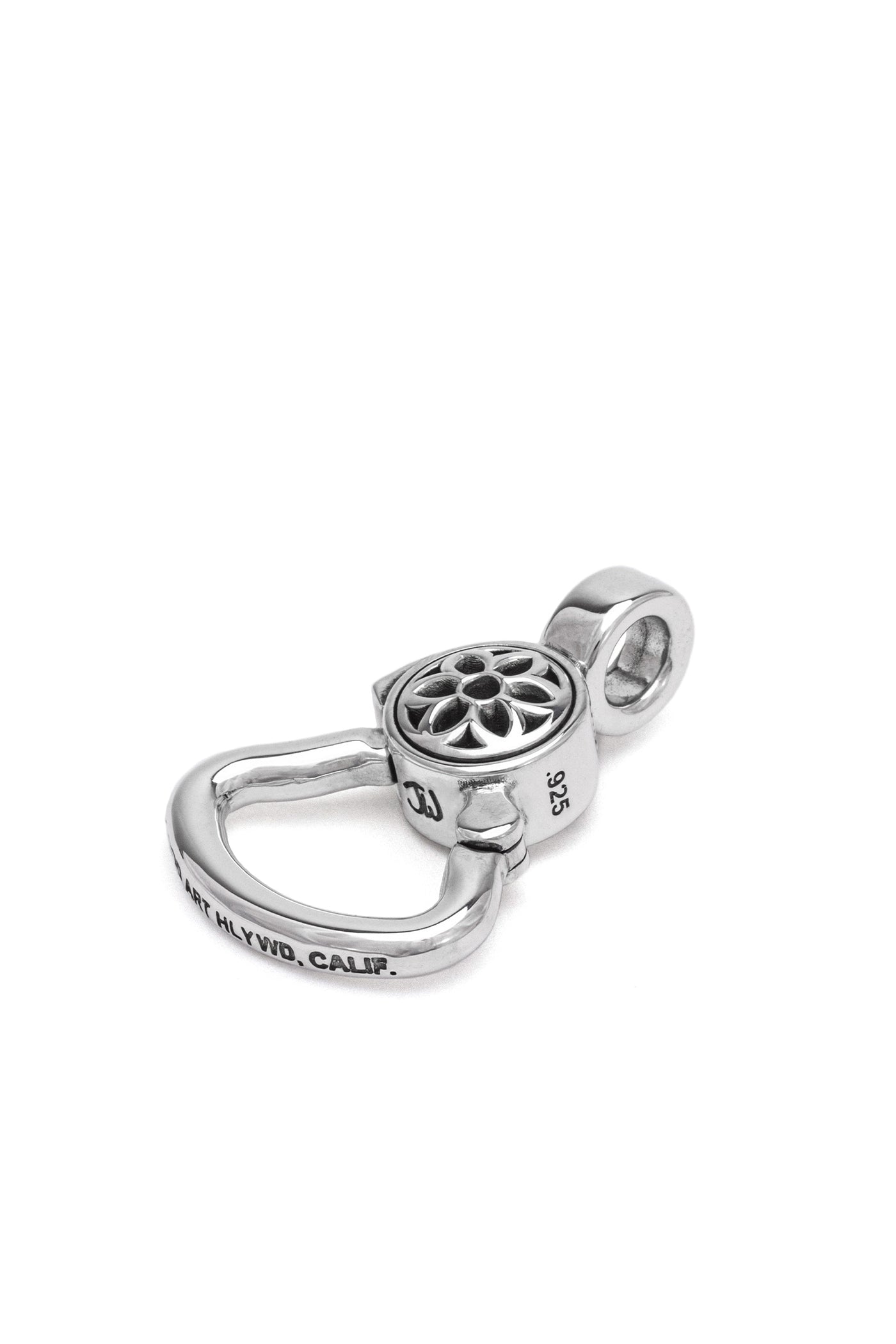 Sterling silver clip pendant with engraved floral detail and markings, polished finish