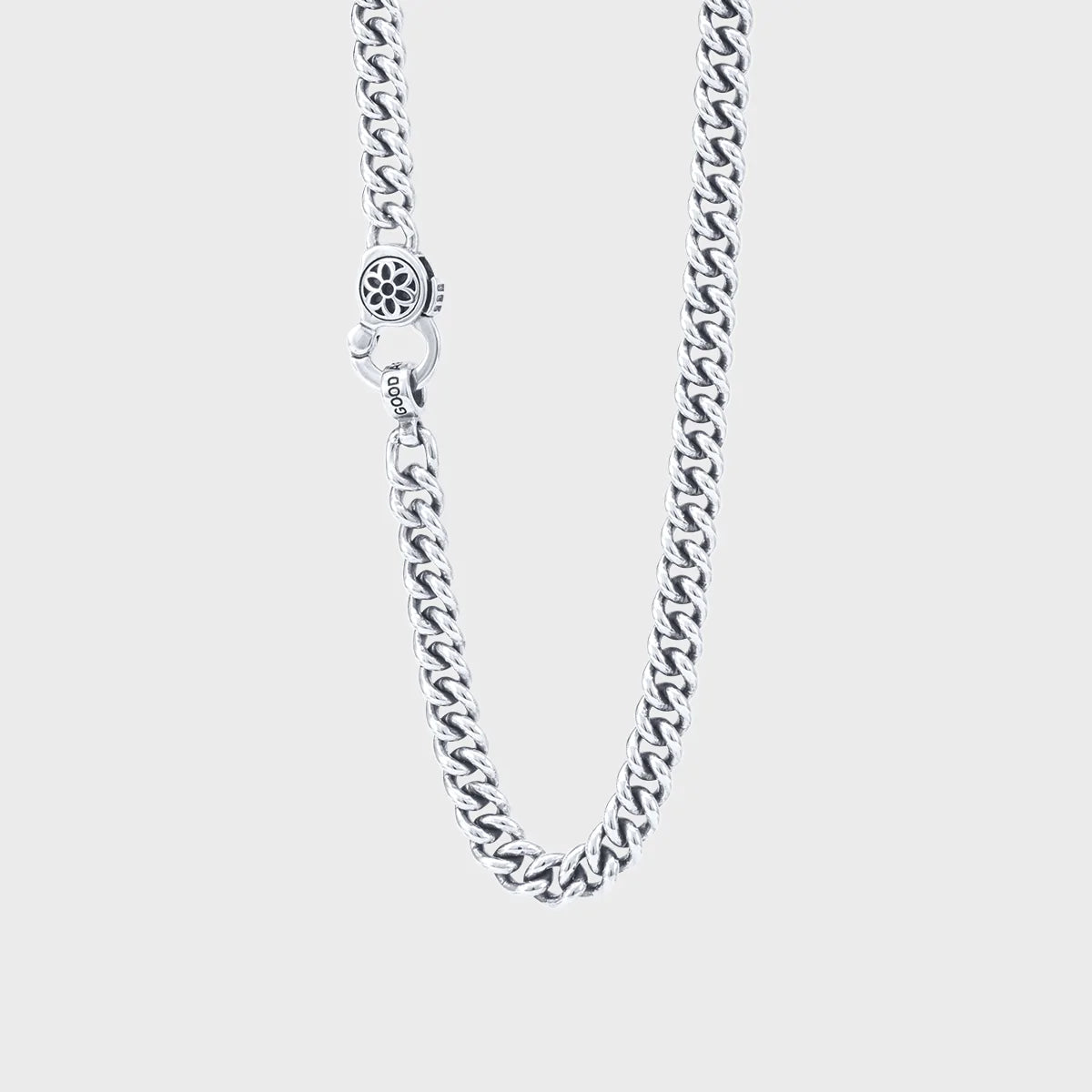 Sterling silver curb chain necklace with decorative floral clasp from Iron Shop Provisions