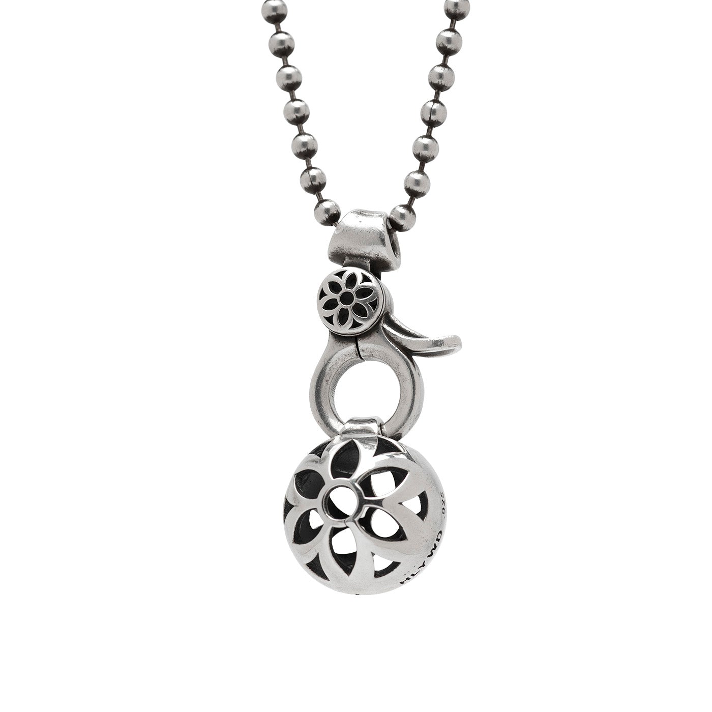 Sterling silver ball chain necklace with intricate floral cutout pendant and clasp detail