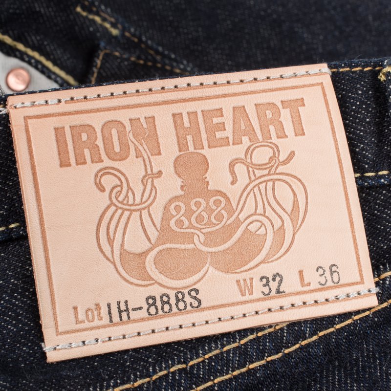 Iron Heart leather patch with octopus logo, model IH-888S, size W32 L36 on dark denim jeans
